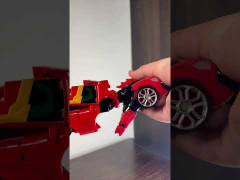 Official YouTube thumbnail for “Metal cardbot Redblitz transformation”.